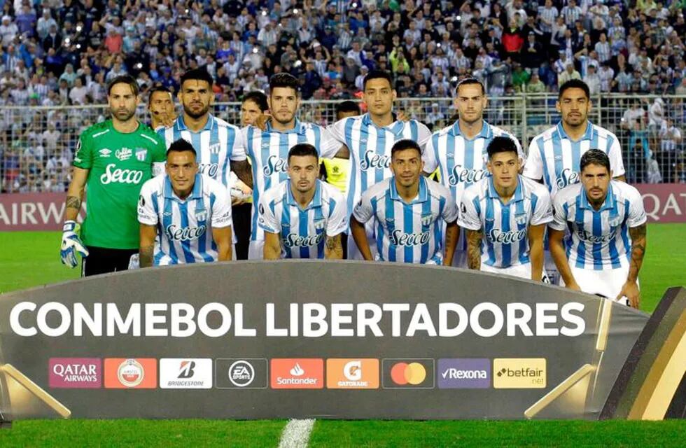 Players of Argentina's Atletico Tucuman pose for pictures before their Libertadores Cup third round football match against Colombia's Independiente Medellin at Monumental Stadium in Tucuman, Argentina, on February 25, 2020. (Photo by Walter Monteros / AFP)