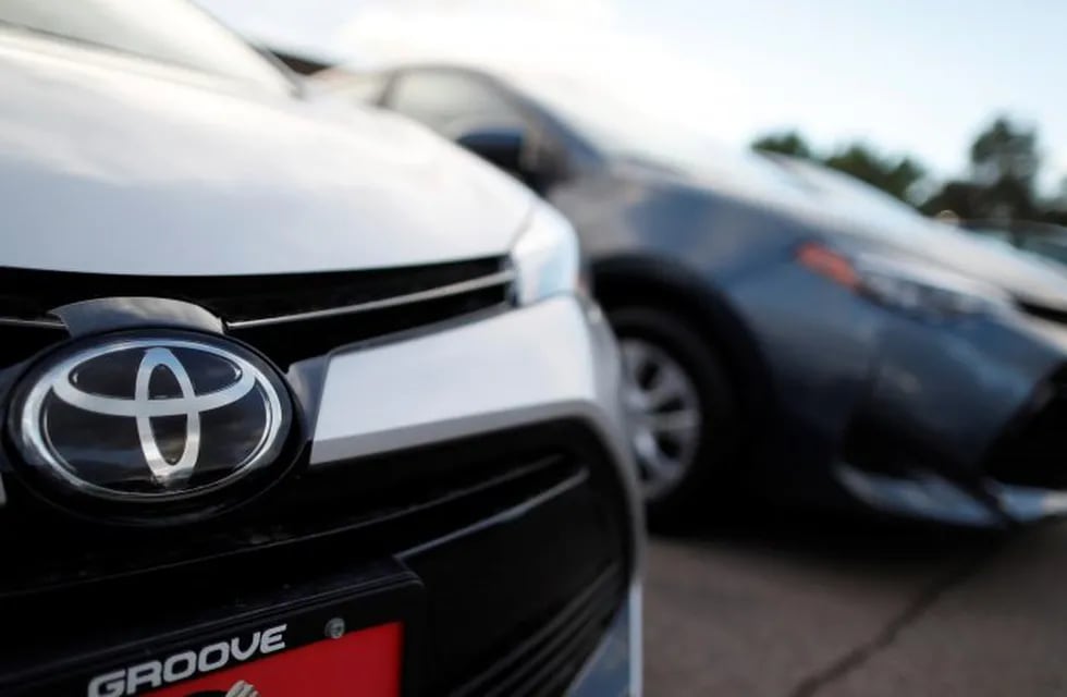 FILE - This Sunday, June 24, 2018 file photo shows the Toyota company logo on a car at a Toyota dealership in Englewood, Colo. Foreign automakers, American manufacturers and classic-car enthusiasts are coming out against President Donald Trump's plan to consider taxing imported cars, trucks and auto parts. Toyota Motor North America says the tariffs \