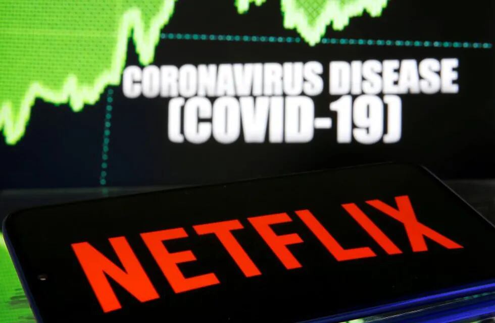 FILE PHOTO: Netflix logo is seen in front of diplayed coronavirus disease (COVID-19) in this illustration taken March 19, 2020. REUTERS/Dado Ruvic/Illustration/File Photo