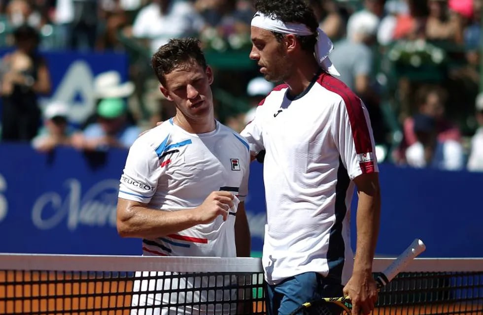 Tennis - ATP 250 - Argentina Open Final - Lawn Tennis Club, Buenos Aires, Argentina - February 17, 2019    Italia's Marco Cecchinato and Argentina's Diego Schwartzman after the final match   REUTERS/Agustin Marcarian