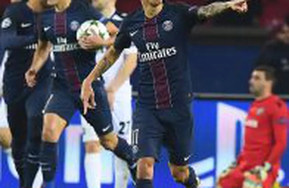 Paris Saint-Germain's Argentinian forward Angel Di Maria celebrates after scoring a goal during the UEFA Champions League Group A football match between Paris Saint-Germain and PCF Ludogorets Razgrad at the Parc des Princes Stadium in Paris on December 6,