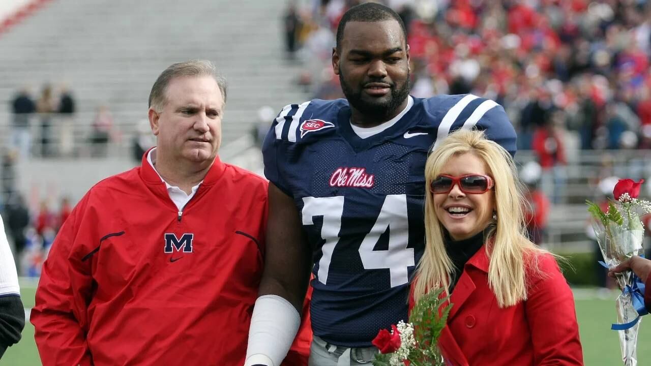 Michael Oher junto a la familia Tuohy.