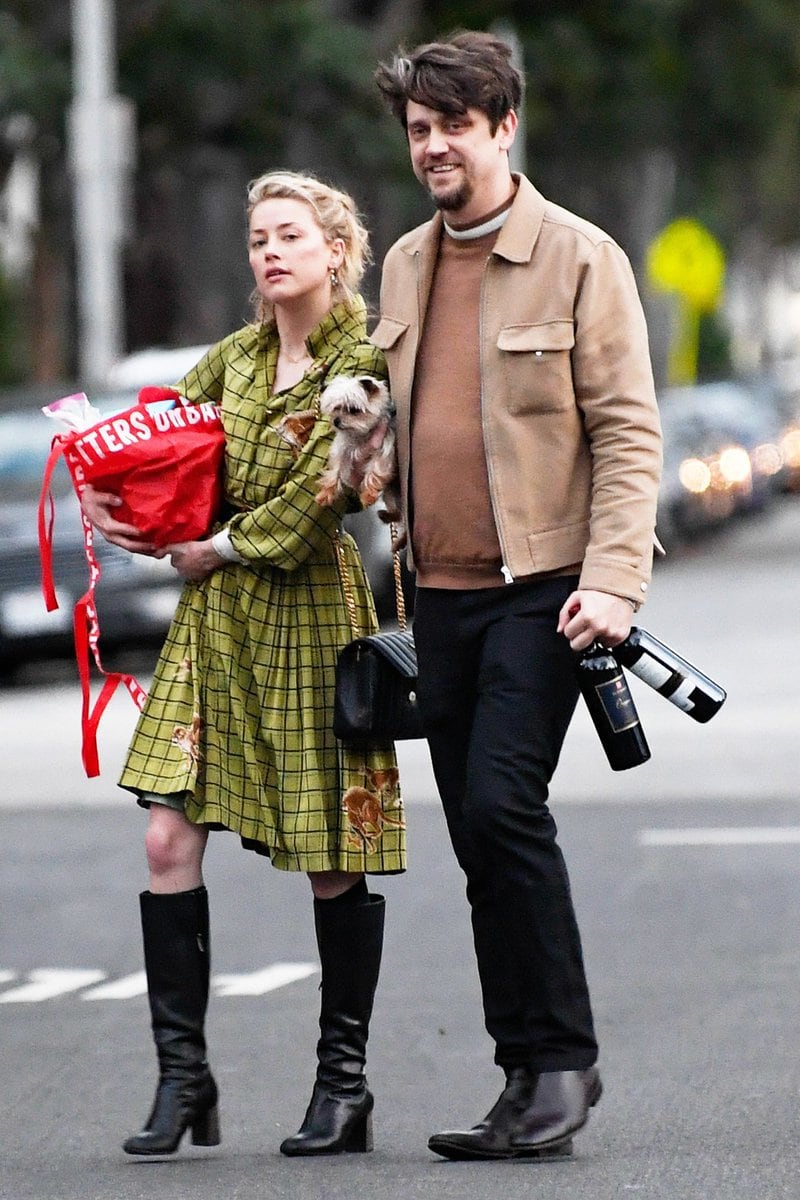 Amber Heard junto a Andy Muschietti.