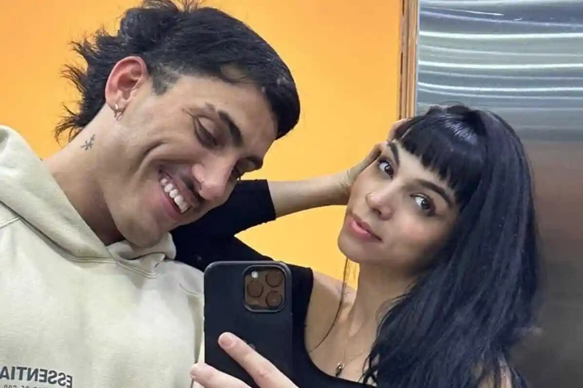 Holder y su novia Agustina, que es estudiante de diseño de indumentaria.