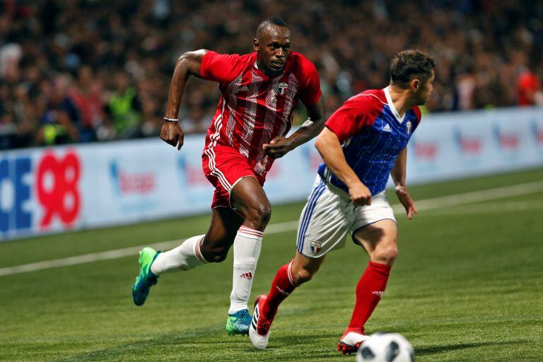 Usain Bolt durante el partido disputado en Francia. Foto: AP/Thibault Camus