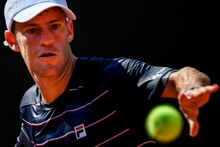 Argentina's Diego Schwartzman plays a forehand to Australia's John Millman on day four of the Men's Italian Open at Foro Italico on September 17, 2020 in Rome, Italy. (Photo by Riccardo Antimiani / POOL / AFP)