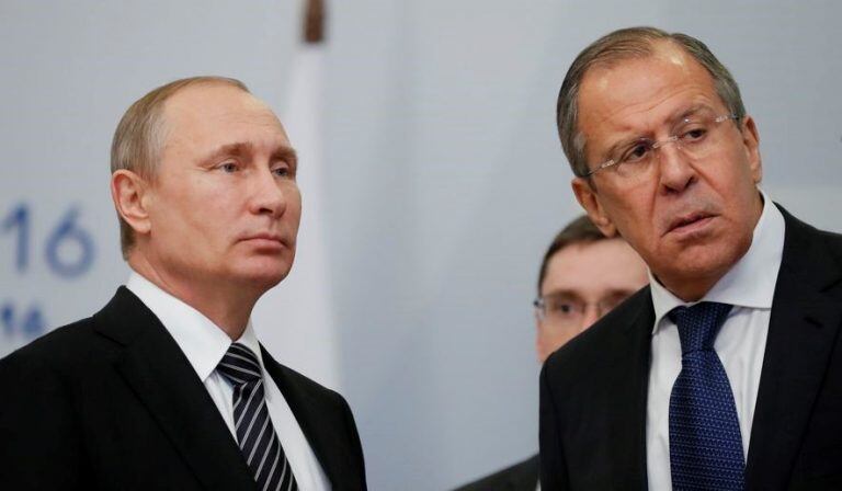 Vladimir Putin y Serguei Lavrov