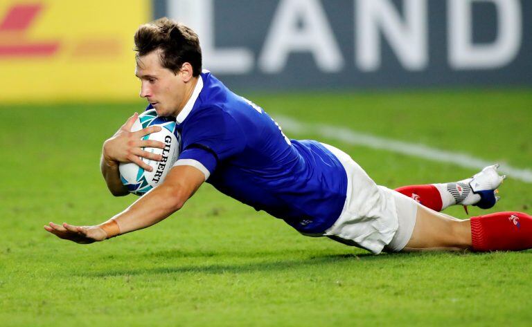 France's Baptiste Serin scores a try during the Rugby World Cup Pool C game at Fukuoka Hakatanomori Stadium between France and the United States in Fukuoka, Japan, Wednesday, Oct. 2, 2019. (AP Photo/Christophe Ena)