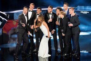 Host Marco Schreyl, Winners of the FIFA FIFPro World11 Manuel Neuer (Germany, Bayern Munich), Daniel Alves (Brazil, Barcelona and Juventus), Sergio Ramos (Spain, Real Madrid), Marcelo (Brazil, Real Madrid), Luka Modric (Croatia, Real Madrid), Toni Kroos (Germany, Real Madrid), Cristiano Ronaldo (Portugal, Real Madrid), from left, and host Eva Longoria, front, take a selfie during the The Best FIFA Football Awards 2016 ceremony held at the Swiss TV studio in Zurich, Switzerland, Monday, Jan. 9, 2017. (Ennio Leanza/Keystone via AP)