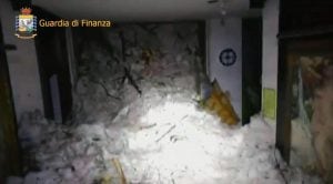 This image made available by the Italian Guardia di Finanza finance police shows the avalanche inside the Rigopiano Hotel, near Farindola, Italy, Thursday, Jan. 19, 2017. Rescue workers reported no signs of life Thursday at a four-star hotel buried by an 