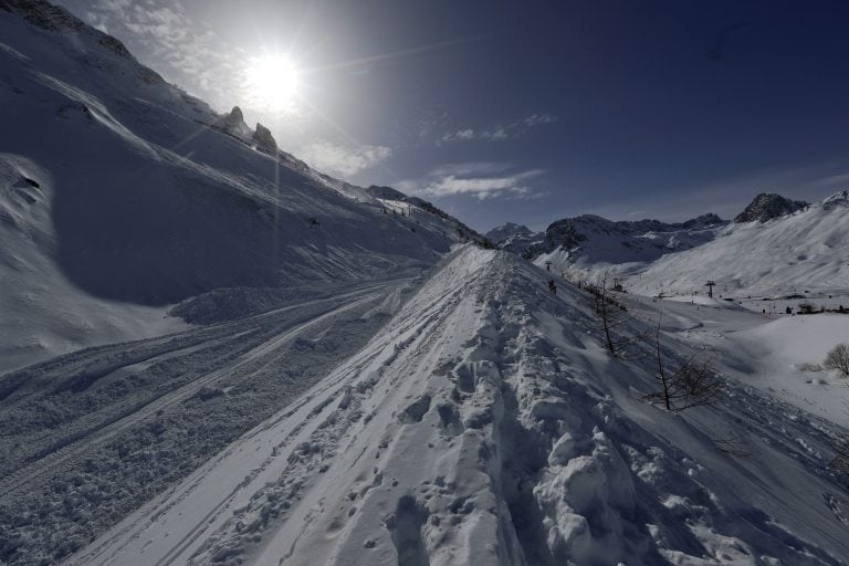 FILE - In this Feb. 14, 2017 file photo shows the Lavachet Wall at the Tignes ski resort, French Alps. French officials say an avalanche has struck the Alpine ski resort of Tignes Tuesday March 7, 2017, and rescue services have launched a search.(AP Photo