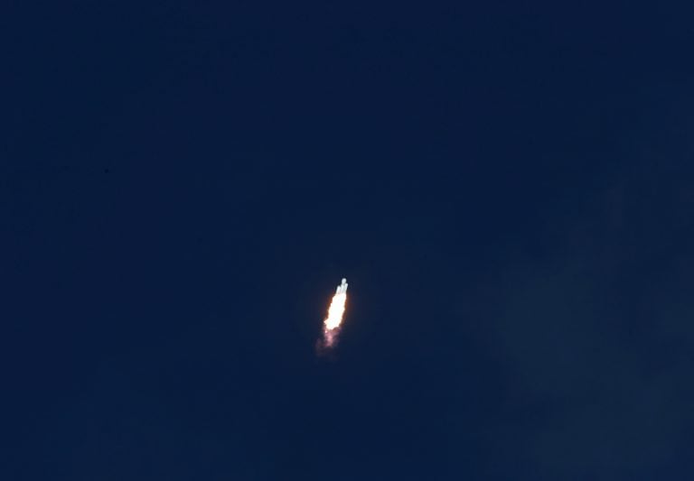 A SpaceX Falcon Heavy rocket climbs toward space after lifting off from historic launch pad 39-A at the Kennedy Space Center in Cape Canaveral, Florida, U.S., February 6, 2018. REUTERS/Joe Skipper