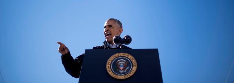 CORRECTION - US President Barack Obama speaks at a Hillary for America campaign event in Cleveland, Ohio, October 14, 2016.nObama warned "democracy itself" is on the ballot in November's presidential election, as White House concern grows about the lasting impact of Republican Donald Trump's campaign. / AFP PHOTO / JIM WATSON / “The erroneous mention appearing in the metadata of these photos by JIM WATSON has been modified in AFP systems in the following manner: [October 14, 2016] instead of [October 13, 2016]. Please immediately remove the erroneous mention from all your online services and delete it from your servers. If you have been authorized by AFP to distribute it to third parties, please ensure that the same actions are carried out by them. Failure to promptly comply with these instructions will entail liability on your part for any continued or post notification usage. Therefore we thank you very much for all your attention and prompt action. We are sorry for the inconvenience