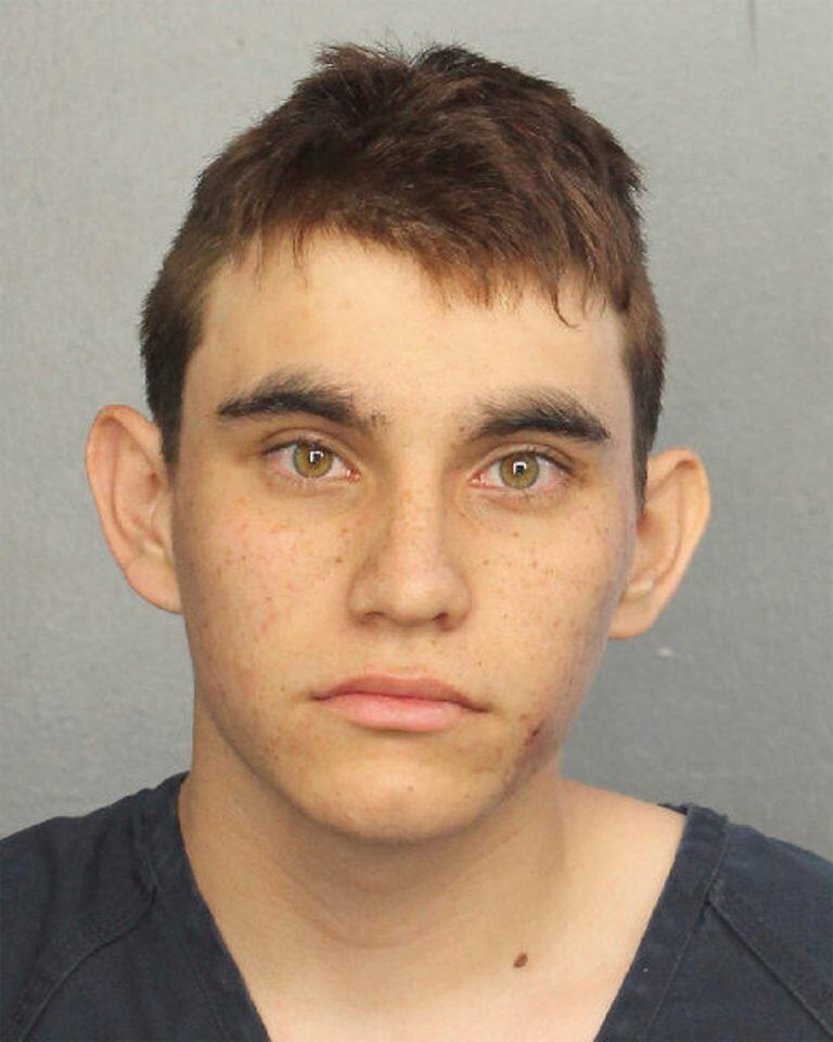 This photo provided by the Broward County Jail shows Nikolas Cruz.  Authorities say Cruz, a former student opened fire at Marjory Stoneman Douglas High School in Parkland, Fla., Wednesday,  Feb. 14, 2018, killing more than a dozen people and injuring several.  (Broward County Jail via AP)