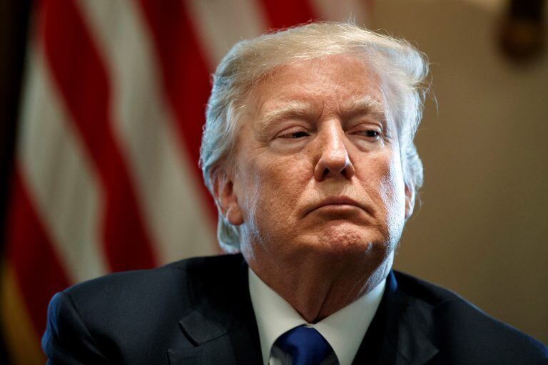 FILE- In this Jan. 9, 2018, file photo, President Donald Trump listens during a meeting with lawmakers on immigration policy in the Cabinet Room of the White House in Washington. Trump used profane language Thursday, Jan. 11, as he questioned why the U.S. should permit immigrants from certain countries, according to three people briefed on the conversation. The White House did not deny the comment. (AP Photo/Evan Vucci, File)