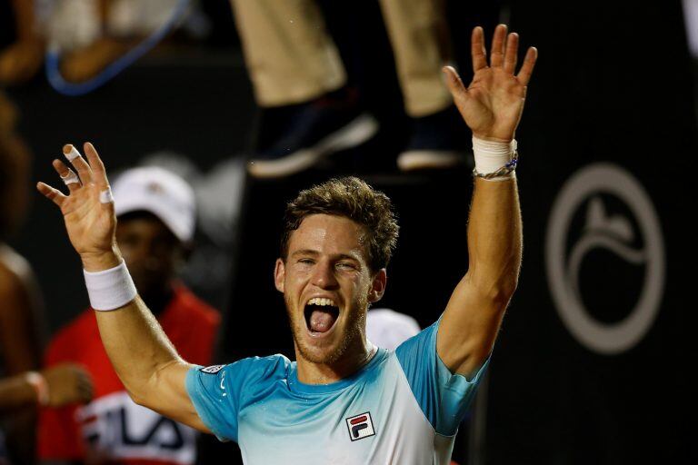 Argentina's Diego Schwartzman celebrates after defeating Spain's Fernando Verdasco at the final match of the Rio Open tennis tournament in Rio de Janeiro, Brazil, Sunday, Feb. 25, 2018. (AP Photo/Leo Correa)