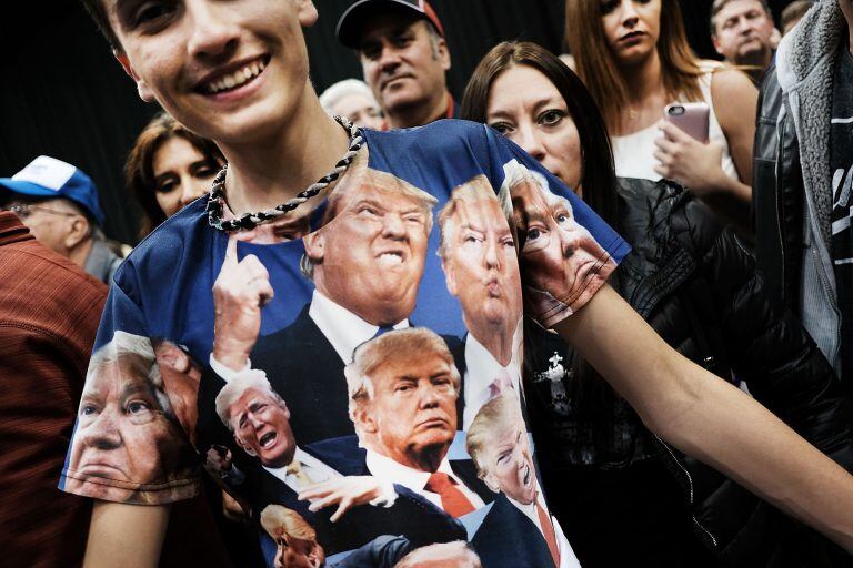 CLEVELAND, OH - OCTOBER 23: A teenager displays a Donald Trump shirt at a Trump rally on October 22, 2016 in Cleveland, Ohio. The election is November 8.   Spencer Platt/Getty Images/AFPn== FOR NEWSPAPERS, INTERNET, TELCOS & TELEVISION USE ONLY ==