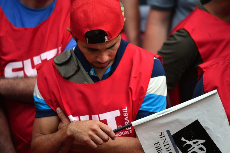 A man shows disappointment, during a demonstration in support of former Brazilian president Luiz Inacio Lula da Silva in Sao Paulo, Brazil on January 24, 2018. 
A Brazilian appeals court Wednesday upheld ex-president Luiz Inacio Lula da Silva's conviction for corruption, effectively ending his hopes of relection this year. Two of the three judges in the appeals court in the southern city of Porto Alegre ruled that his original 9.5-year jail sentence be extended to more than 12 years.
 / AFP PHOTO / NELSON ALMEIDA