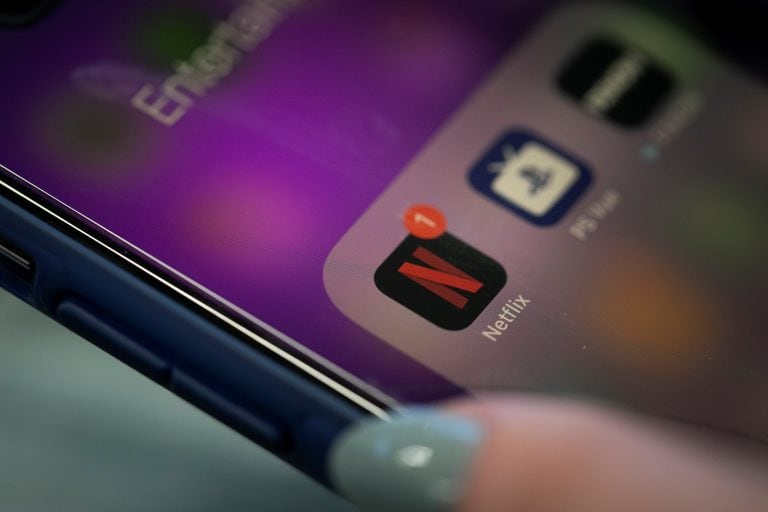 This Tuesday, Oct. 8, 2019, photo shows the Netflix app on an iPhone in New York. Netflix reports financial results Wednesday, Oct. 16. (AP Photo/Jenny Kane)