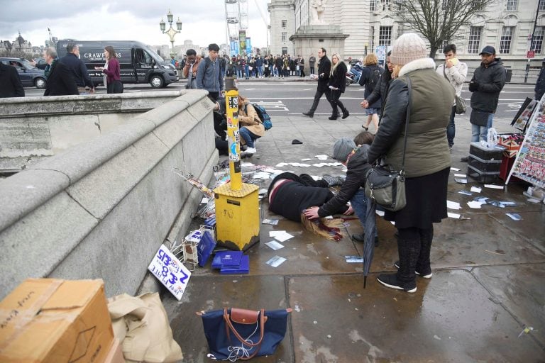 Injured people are assisted after an incident on Westminster Bridge in London, Britain Britain March 22, 2017.  REUTERS/Toby Melville