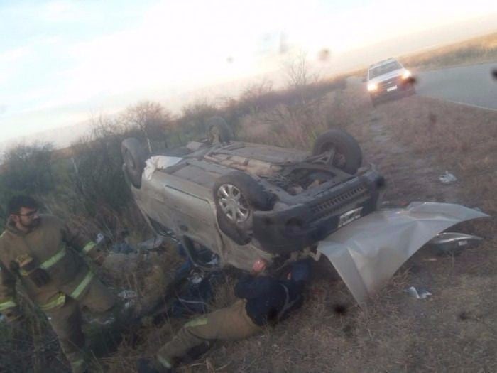 Bomberos cuando intentaban rescatar a Andreotti.