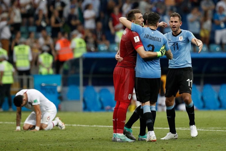 Muslera festeja con sus compañeros