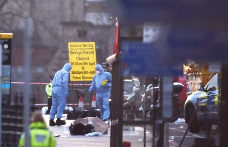 Forensics investigators work at the scene after an attack on Westminster Bridge in London, Britain March 22, 2017.    REUTERS/Hannah McKay