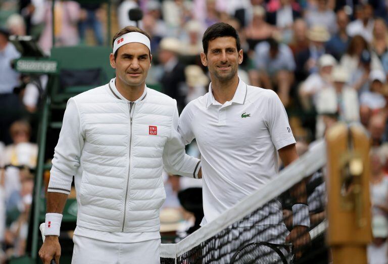 Los maestros del tenis en la previa del partido (AP Photo/Tim Ireland)