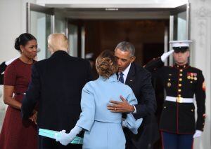 US President Barack Obama(R) and First Lady Michelle Obama(L) welcome Preisdent-elect Donald Trump(2nd-L) and his wife Melania(2nd-R) to the White House in Washington, DC January 20, 2017.  / AFP PHOTO / JIM WATSON