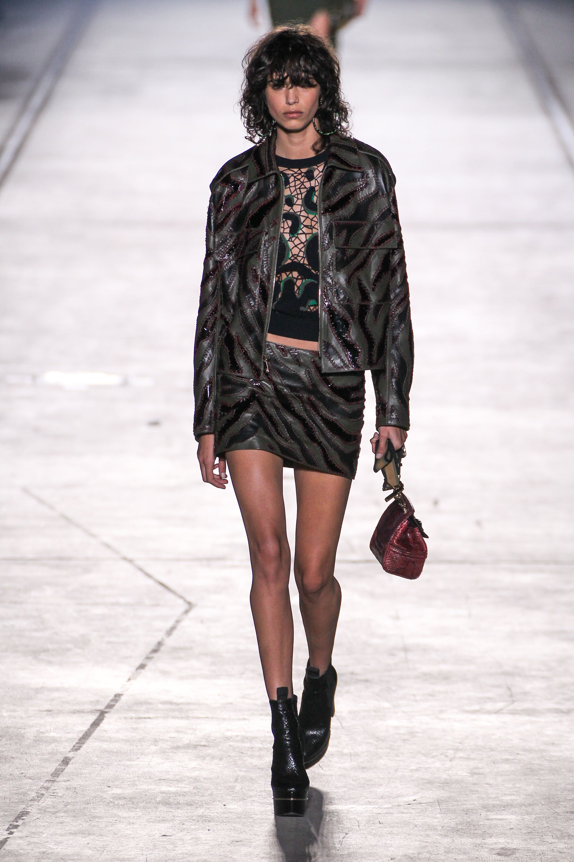 MILAN, ITALY - SEPTEMBER 25: A model walks the runway during the Versace fashion show as part of Milan Fashion Week Spring/Summer 2016 on September 25, 2015 in Milan, Italy.