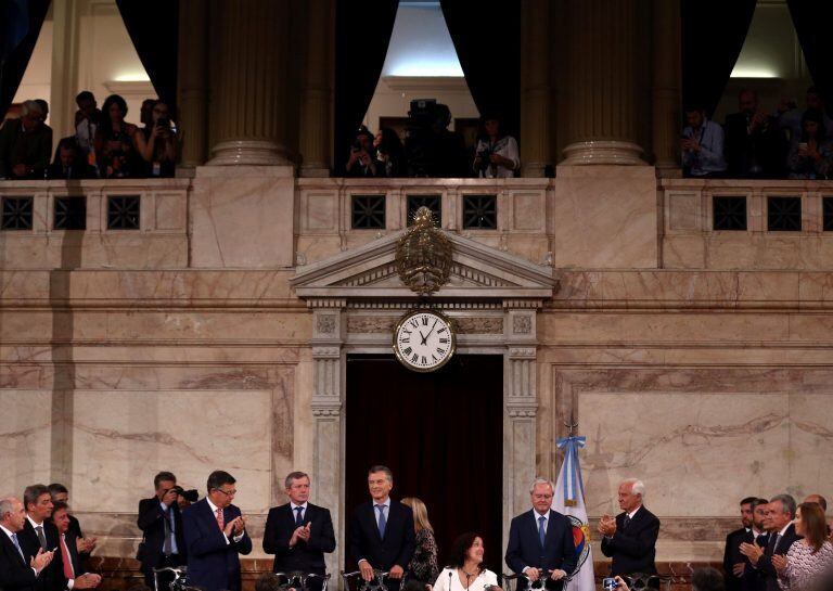 Argentina's President Mauricio Macri is applauded as he arrives for the opening session of the 136th legislative term at the Congress in Buenos Aires, Argentina, March 1, 2018. REUTERS/Marcos Brindicci