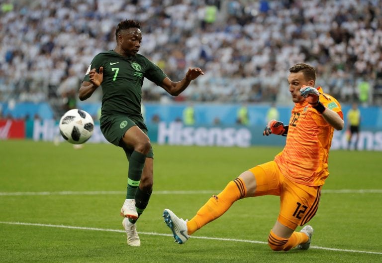 Nigeria's Ahmed Musa, left, and Argentina goalkeeper Franco Armani compete for the ball during the group D match between Argentina and Nigeria at the 2018 soccer World Cup in the St. Petersburg Stadium in St. Petersburg, Russia, Tuesday, June 26, 2018. (AP Photo/Dmitri Lovetsky)