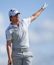 Argentina's Emiliano Grillo indicates a wayward drive from the 13th tee during his first round on the opening day of the 2016 British Open Golf Championship at Royal Troon in Scotland on July 14, 2016.
Former British Open champions Phil Mickelson and Jus