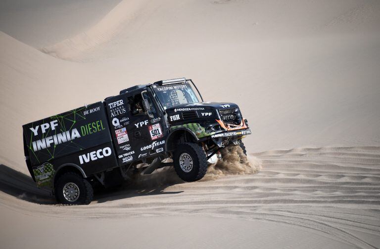 Iveco's Argentine truck driver Federico Villagra, co-driver Ricardo Torlaschi and mechanic Adrian Yacopini compete during the 2018 Dakar Rally Stage 5 between San Juan De Marcona and Arequipa in Peru, on January 10, 2018.
Sebastien Loeb was forced to pull out of the Dakar Rally after a back injury suffered by his co-driver in a disastrous fifth stage won by defending champion Stephane Peterhansel. / AFP PHOTO / Franck FIFE