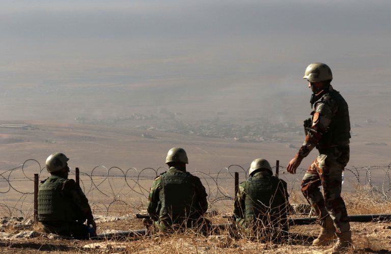 Iraqi Kurdish Peshmerga fighters hold a position on the top of Mount Zardak, about 25 kilometres east of Mosul, as they take part in an operation against Islamic State (IS) group jihadists, on October 17, 2016.
Thousands of Iraq's Kurdish peshmerga forces