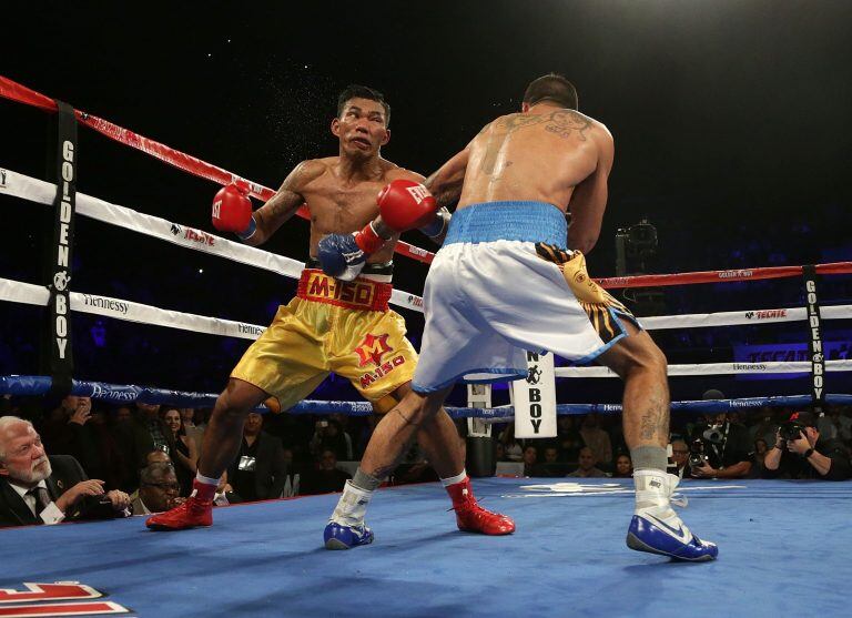 INGLEWOOD, CA - JANUARY 27: Tewa Kiram (L) of Thailand is knocked out by Lucas Matthysse of Argentina during their bout at The Forum on January 27, 2018 in Inglewood, California.   Jeff Gross/Getty Images/AFP
== FOR NEWSPAPERS, INTERNET, TELCOS & TELEVISION USE ONLY ==