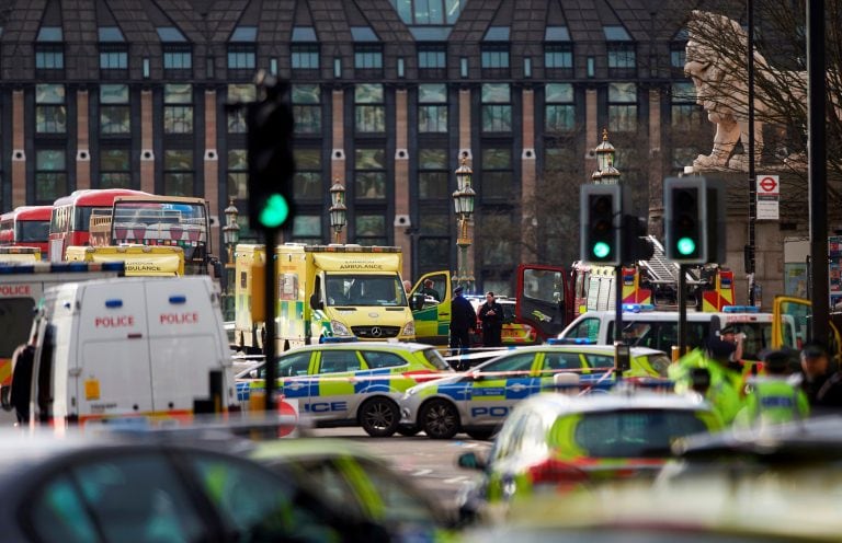 Members of the emergency services work on Wesminster Bridge, alongside the Houses of Parliament in central London on March 22, 2017 during an emergency incident.
British police shot a suspected attacker outside the Houses of Parliament in London on Wednes