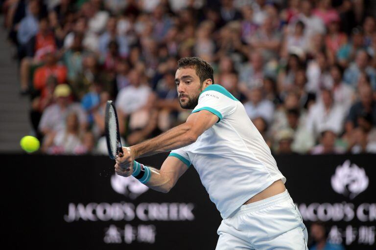 El tenista croata Marin Cilic, el 25/01/2018 en Melbourne, Australia, durante el partido que lo enfrentó con el británico Kyle Edmund en el Abierto de tenis del país. Foto: Lukas Coch/AAP/dpa