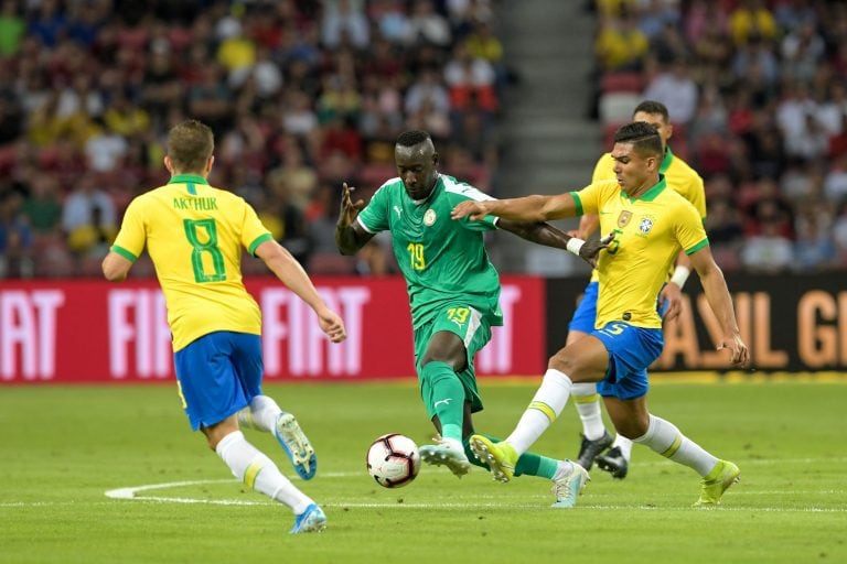 Senegal's Famara Diedhiou (C) during the friendly international football match between Brazil and Senegal at the National Stadium in Singapore on October 10, 2019. (Photo by Roslan RAHMAN / AFP)