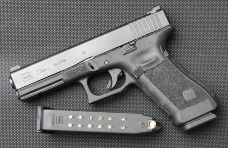 Pistola calibre 40 marca Glock.