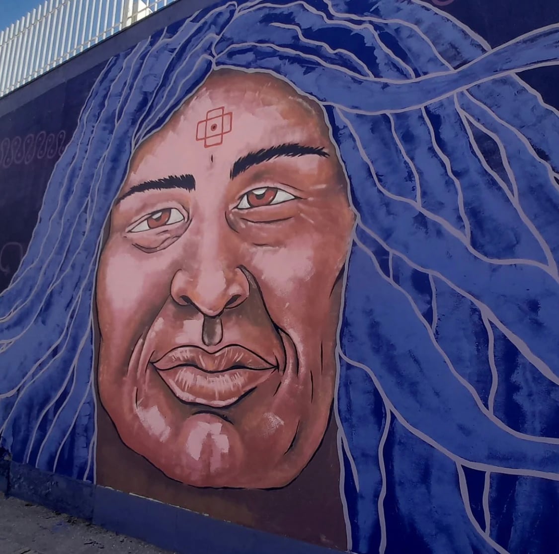 La mujer huarpe, es la protagonista principal del mural.