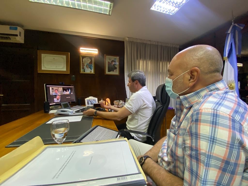 El gobernador Sergio Uñac y el ministro de Obras, Julio Ortiz Andino, en una reunión por el Túnel de Agua Negra.