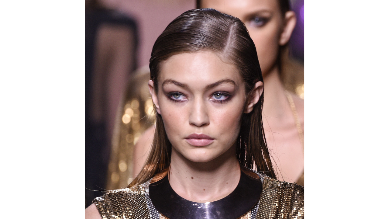 Gigi con "greasy look".