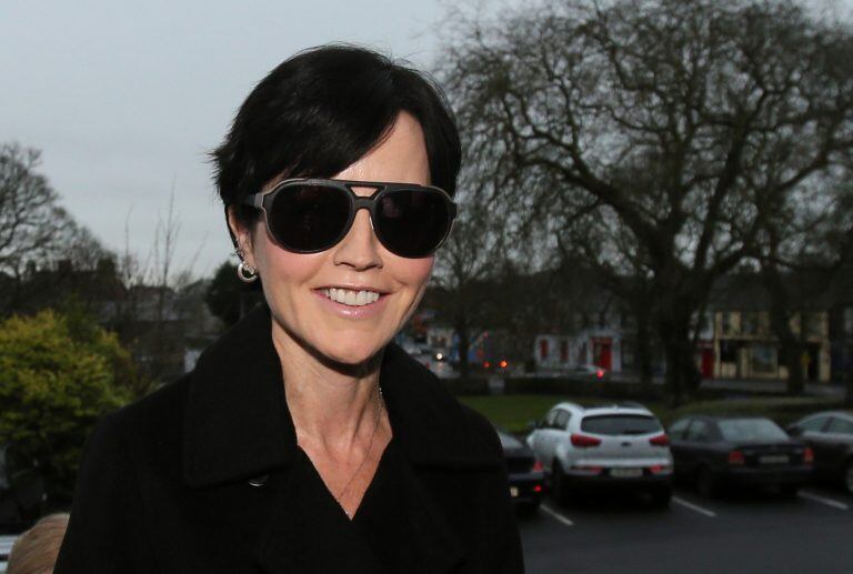 FILE - In this Dec. 16, 2015 file photo, Cranberries singer Dolores O'Riordan arrives at Ennis District Court, in Ennis, Ireland. O'Riordan, lead singer of Irish band The Cranberries, has died. She was 46, it was reported on Monday, Jan. 15, 2018. (Niall Carson/PA via AP, File)