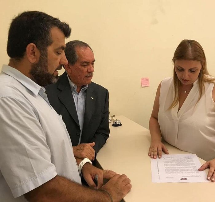 Pablo Tedesco, Presidente de la FECh (izquierda), junto al vicepresidente de la CAME Chubut, Rubén Villagra (centro).