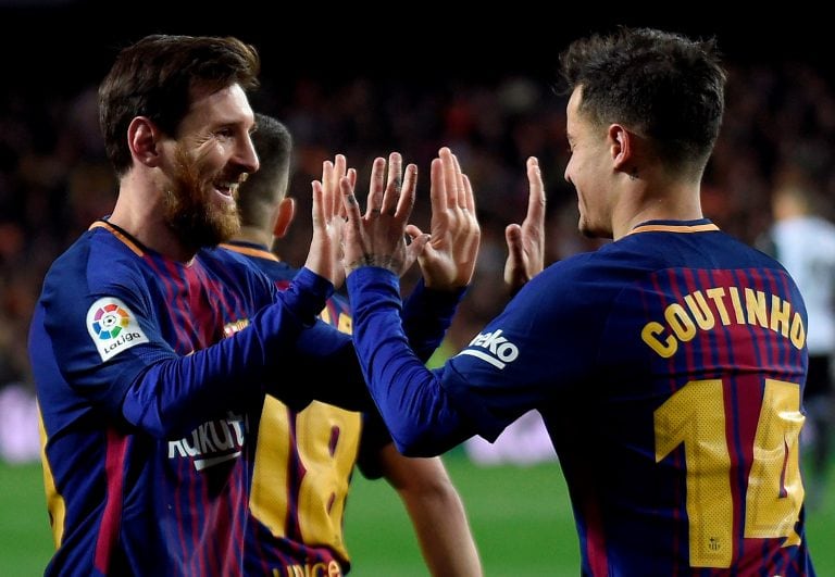 Coutinho con Messi