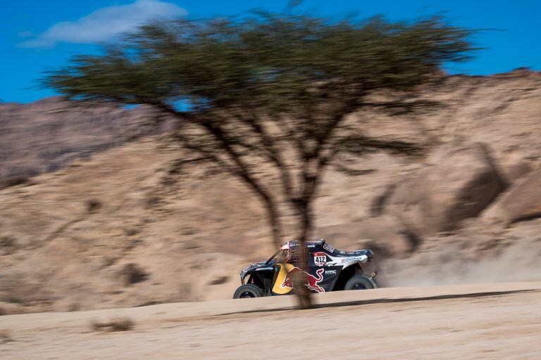 El estadounidense Mitchell Guthrie, navegado por el noruego Ola Floene, en el Canam Maverick X3 del Red Bull Off-Road team USA.