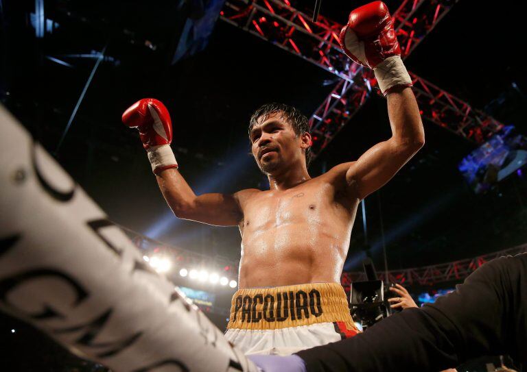 LAS VEGAS, NEVADA - APRIL 09: Manny Pacquiao celebrates after defeating Timothy Bradley Jr. by unanimous decision in their welterweight championship fight on April 9, 2016 at MGM Grand Garden Arena in Las Vegas, Nevada.   Christian Petersen/Getty Images/AFP
== FOR NEWSPAPERS, INTERNET, TELCOS & TELEVISION USE ONLY == las vegas nevada eeuu Manny Pacquiao boxeo  pelea de peso welter del campeonato boxeo boxeador festejo triunfo