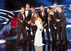 Football Soccer - FIFA Awards Ceremony -  FIFA World 11 award  - Zurich, Switzerland - 09/01/17.  Manuel Neuer, Dani Alves, Sergio Ramos, Marcelo, Luka Modric, Toni Kroos and Christiano Ronaldo pose with the hosts U.S. actress Eva Longoria and German presenter Marco Schreyl.   REUTERS/Ruben Sprich