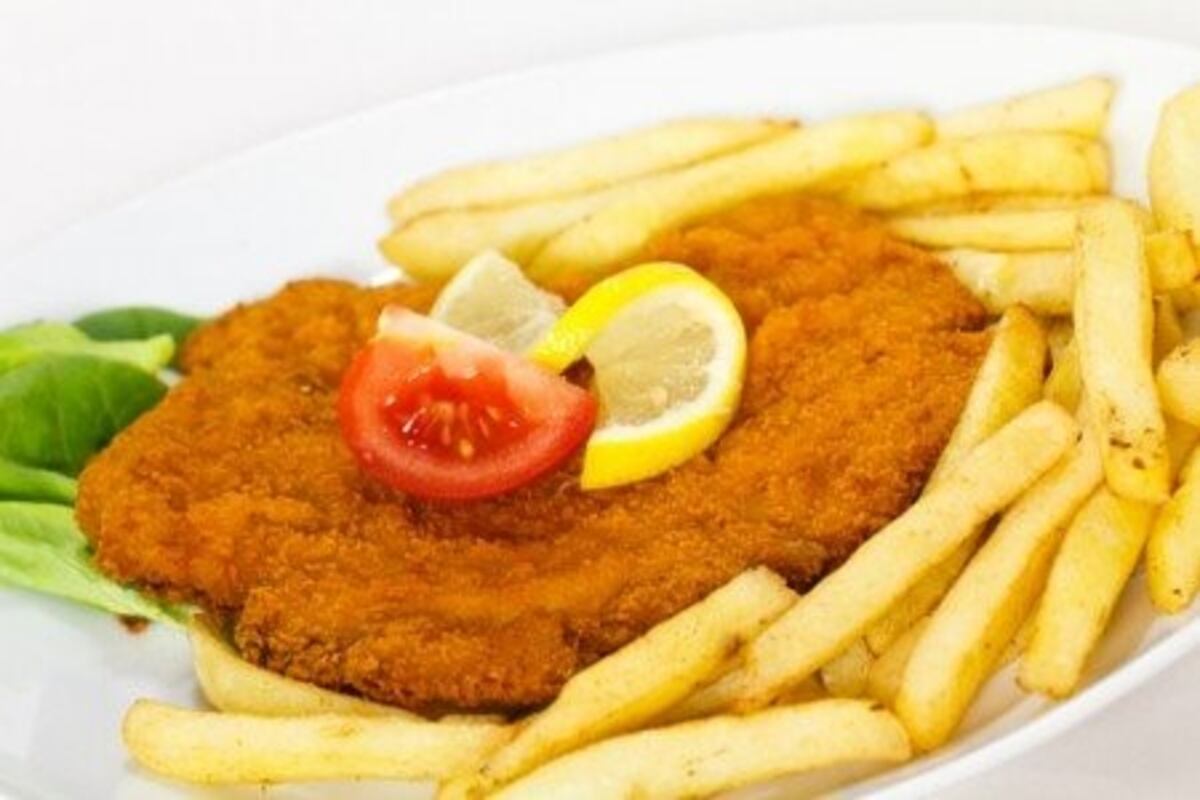 Cocina porteña: los secretos para preparar una milanesa con papas fritas perfecta